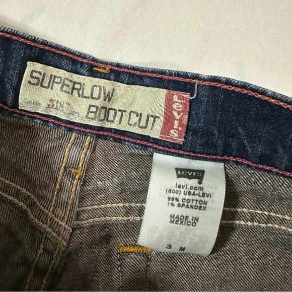 Levi’s Super Low Bootcut Darkwash Jeans - Picture 2 of 6